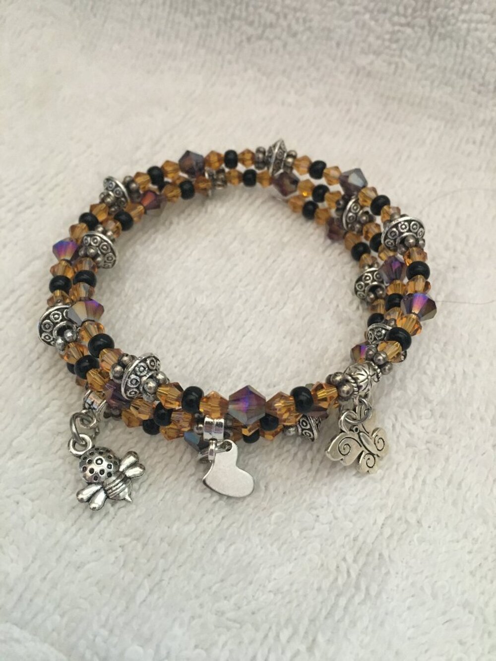 Triple‑Wrap Memory Wire Bracelet – Amber Crystal, Silver Accents & Charms